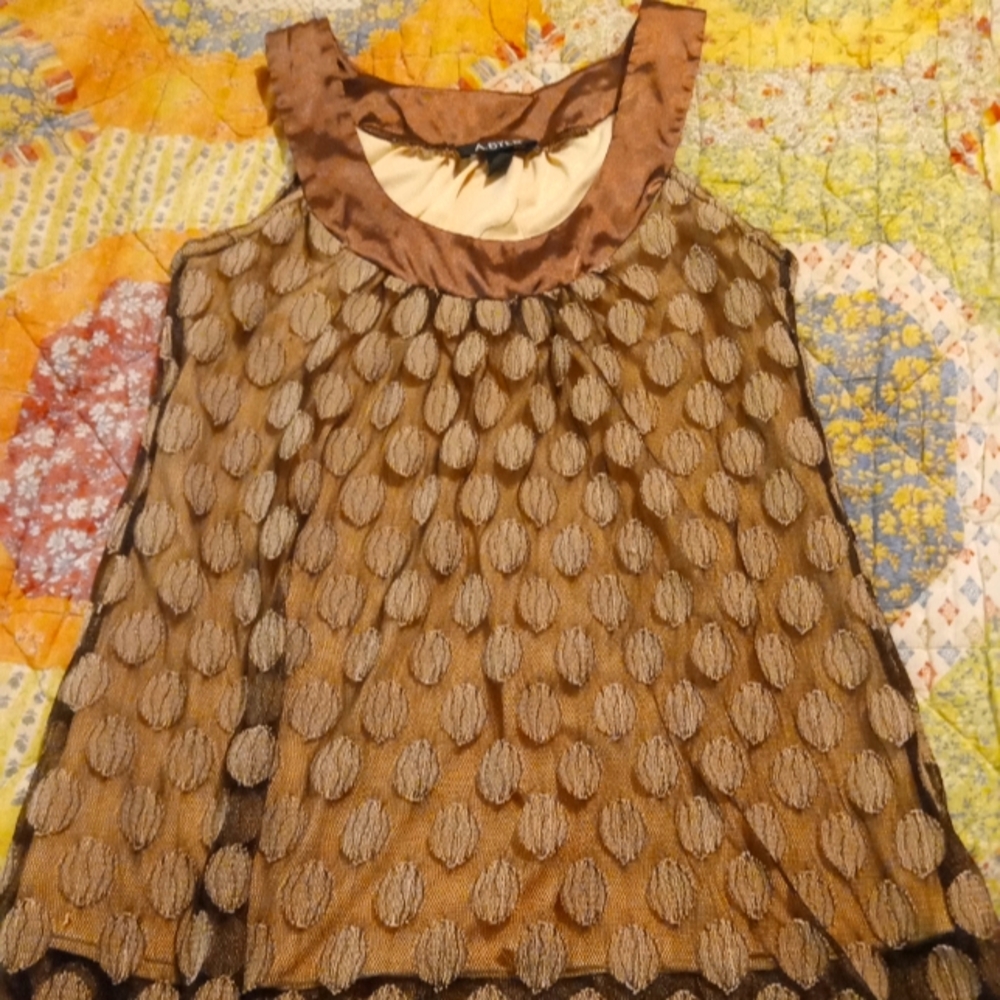 A. Byer sleeveless top